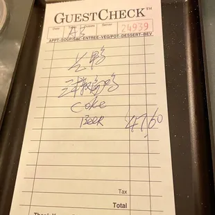 Check before tip for half duck, one dish (3 Pepper Chicken), soda (can) and a Heineken.