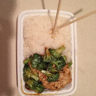 Chicken and broccoli with white rice dinner combination. I don&apos;t think they could cram any more food in the container!