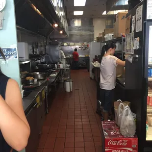 a woman in a restaurant kitchen