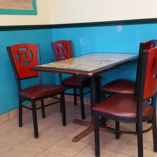 a table and chairs in a restaurant