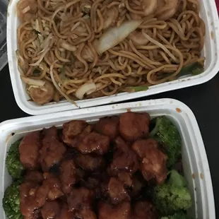 two take out containers of food