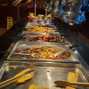 a buffet of food being served