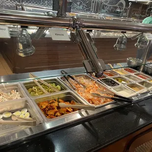 a buffet with a variety of food items