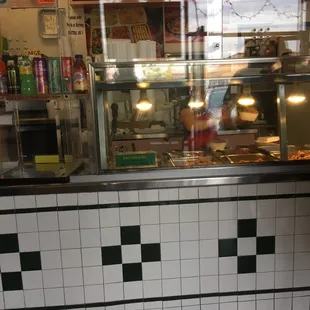 a view of a restaurant counter