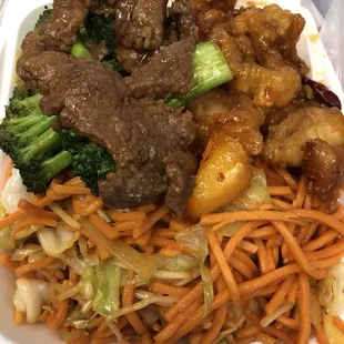 beef and vegetables in a styrofoam container