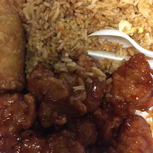 sesame chicken with fried rice &amp; egg roll lunch combo. generous portion!