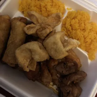 a styrofoam container with rice, meat, and mushrooms