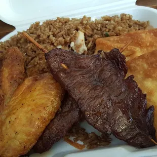 #33 Bbq satay beef,  chicken wings,  Crab Rangoo lunch special with fried rice and egg roll.