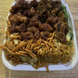 a take out container of chinese food