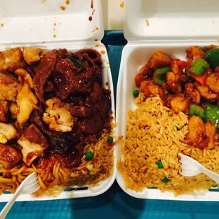 two take out containers of food