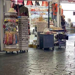 Downstairs part of the upstairs where lady tries to get you to go upstairs. Same kind of stuff but less.