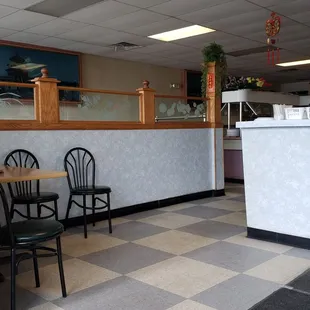 Part of entrance and dining area.