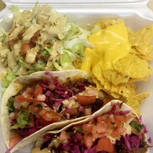 BBQ pork tacos with side salad and chips with queso!
