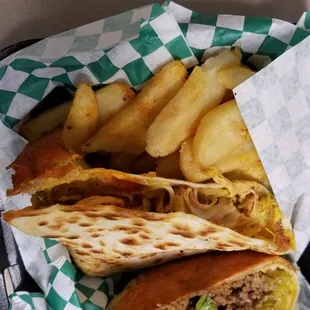 Cheeseburger quesadilla and buffalo chicken quesadilla with fries.