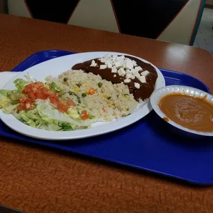 enchilada plate with a side of beans!