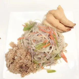 a plate of food with rice and vegetables