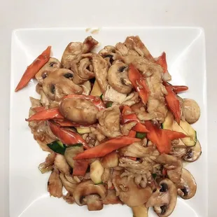 a plate of stir fried vegetables