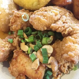 a plate of fried chicken and rice