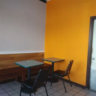 a table and chairs in a restaurant