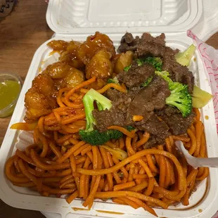 Orange chicken, beef broccoli, with noodles.