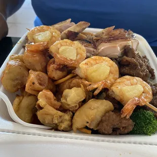 Martin's combo grilled shrimp, teriyaki chicken, broccoli beef, rice and chow mein. Happy birthday my love