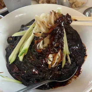 Jjajiangmian (black bean noodle).  Get this!  Kids love it.