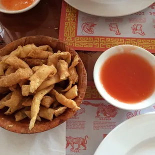 They always have fried noodles and duck sauce before they bring out your food.