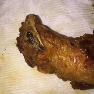 This is Chicken from Chinese Delight, there are two bugs fried into the chicken. After eating two pieces this was discovered.