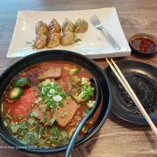 I had fried dumpling and tomatoes beef noodles. Oh man it is too die for. This place Is a must of you are in the area.