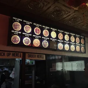 menus on the wall of the restaurant