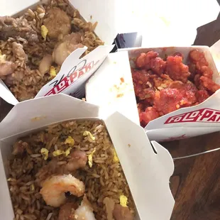 three take out boxes of food