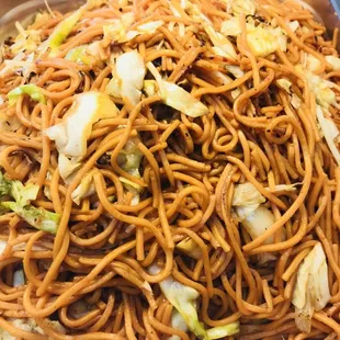 a plate of noodles and vegetables