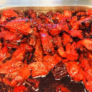 a pan full of chicken wings
