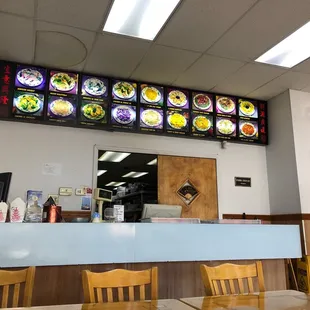 a restaurant counter and menus