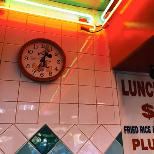 a clock on the wall of a restaurant
