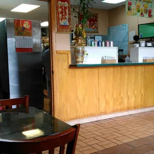 a table and chairs in a restaurant