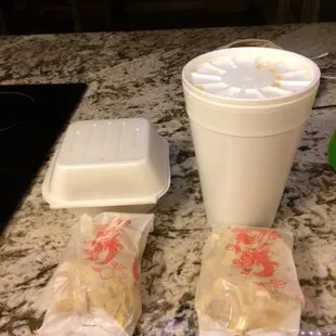a plastic container and a plastic container on a granite countertop