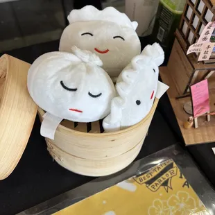 a basket full of stuffed animals