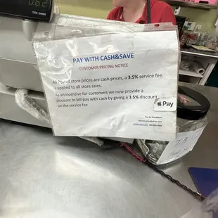 a woman at a cash register