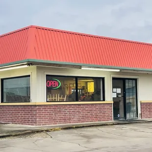 a restaurant with a red roof