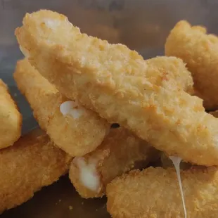 a pile of deep fried fish sticks