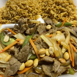 beef, rice, and vegetables in a styrofoam container