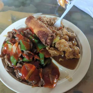 Pepper beef, orange chicken, egg roll and fried rice