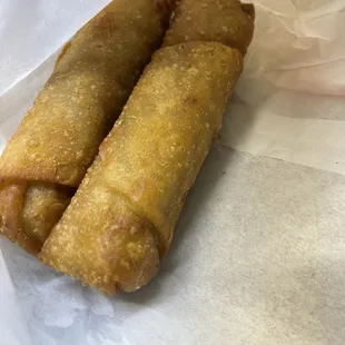 a close up of two fried food items