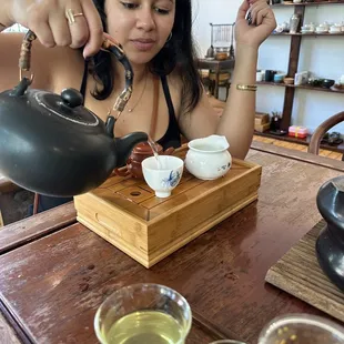 Pouring the green tea.