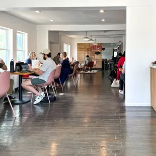 Inside. Full tables. This neighborhood has been missing a coffeeshop you can walk to.