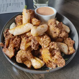 Fried cauliflower and tteokbokki.
