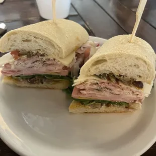 Build your own sandwich.  Mortadella, ham and pancetta with provolone, olive tapenade and arugula. BOMB!!!