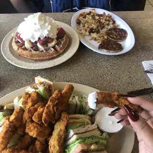 Clubhouse sandwich with a side of zucchini