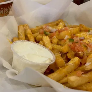a basket of fries and a drink